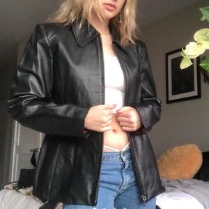 Zip up leather jacket with red lining